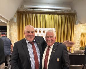 Outgoing Rugby Southland president Leicester Rutledge (left) with replacement Rex Carter. PHOTO:...