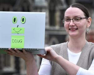 University of Otago student administration team leader Louise Ross with Doug, the Domestic Otago...