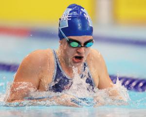 Neptune swimmer Lily McGrath on her way to setting an Otago record in the 100m breaststroke at...