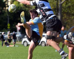 University halfback Brad Campbell clears the ball during a Dunedin division 1 club game against...