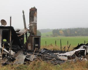 An unoccupied farmhouse burned down last week in Otaraia, Southland. PHOTO: ELLA SCOTT-FLEMING