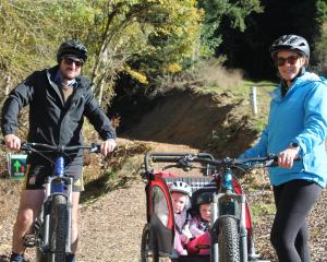 Ready to test out the new Waikaia forest tracks are Benji and Zoe Gillespie with their daughters...