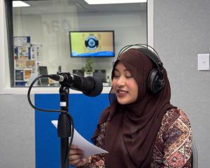 Asya Ahmadasri records her podcast for Layers of Identity on OAR FM. Photo: supplied