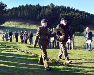 Lt Natasha Whyte, from Burnham Military Camp, and her grandfather Glenn Whyte lay a wreath for...