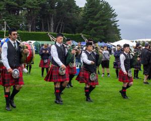 South Canterbury pipe major William McArthur (left) leads the band on to the competition board at...