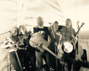 The Eastern lead singer, songwriter and guitarist Adam McGrath (centre) with fellow band members...