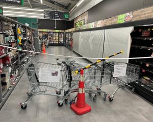 The area with scaffolding at Woolworths, to the right of the gasworks, is roped off internally....