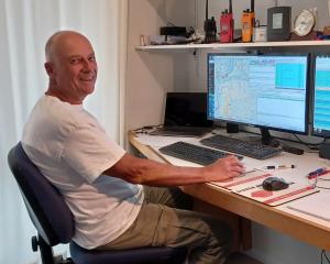 Bart Kindt works on his computers at his Ettrick home. PHOTO: SUPPLIED