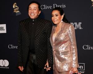Singer&nbsp;Smokey&nbsp;Robinson and his wife Frances Glandney attend the Pre-Grammy Gala in...