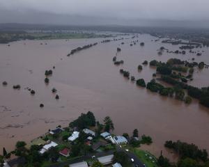A drone view shows a flooded area following heavy rains, in Tinonee, New South Wales yesterday....