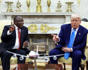 US President Donald Trump meets South African President Cyril Ramaphosa in the Oval Office of the...