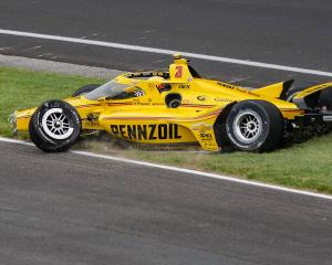 Scott McLaughlin’s Indy 500 ends early. PHOTO: REUTERS
