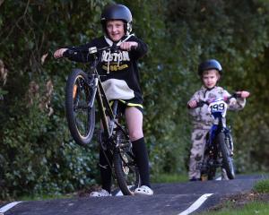 Macandrew Bay pupils Jack Mooney, 11, (front) and Connor Blair, 5, try out their school’s new...