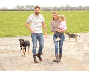 Canterbury sharemilkers Braden and Brigitte (Biddy) Barnes with youngest daughter, Ginny, 2, want...
