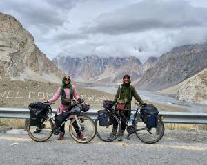 Isobel Ewing (left) and Georgia Merton during their cycling journey along the Karakoram Highway...