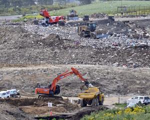 An excavator works at the Green Island Landfill. PHOTO GERARD O'BRIEN/ODT