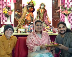 New Dunedin Hindu temple preacher Sankirtan Krishnadas (left) with priests Mohini Devidasi and...