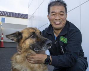 Robert Jiang and his german shepherd Max. PHOTO: GEOFF SLOAN