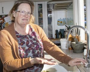 Claire Burridge and Grange St residents have dealt with about a dozen water outages since 2022....