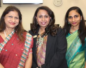 Indian High Commissioner Neeta Bhushan (left) sparked off the smile train with Anu John and...