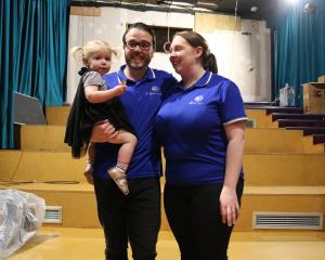 Grace and Chris Rottenberry, holding their daughter Mia, 2, are delighted a third theatre at The...