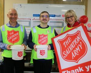 Salvation Army Captains Paul and Jocelyn Smith with Cameron McIntosh, 19, of Oamaru, who spent...