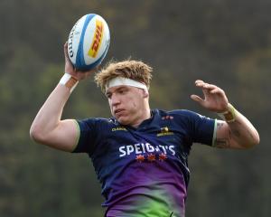 Highlanders lock Fabian Holland leaps high during a lineout drill at Logan Park earlier this week...