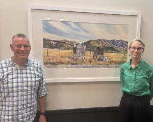 Canterbury artist Kelvin McMillan and RSM Law Plunket Art Show committee member Julia Traylor...