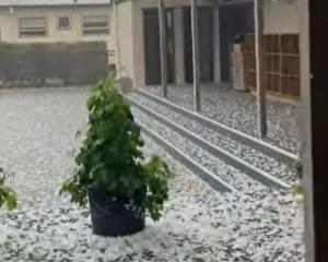 Hail at St Peter's Catholic School in Cambridge, Waikato this afternoon. Photo: Screen grab via RNZ
