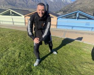 Michael Heyes stretches in Queenstown on Tuesday. PHOTO: PHILIP CHANDLER


