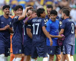 Auckland City players celebrate after the match. Photo: Reuters