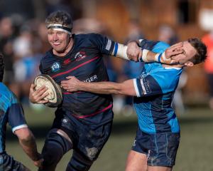 Arrowtown’s Malcolm Sutherland brushes off Wakatipu Prems’ Logan Beggs during last Saturday’s...