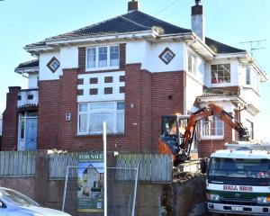 The house at 339 Highgate gets demolished to make way for new townhouses. PHOTO: PETER MCINTOSH