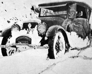 An ‘Aard’ service car operated by Dunedin-Pembroke Motors encounters snow on the Crown Range. —...