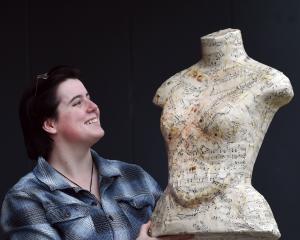 Otago Polytechnic student Emily Gilbert shows off the papier mache  torso she created, at the...