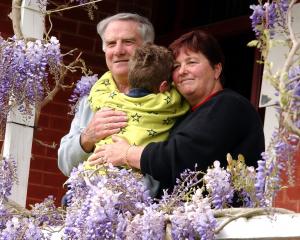 Foster parents Jim and Ann Dick with one of their charges. Photo: Jane Dawber