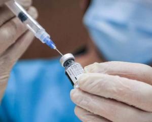 Initial research shows being fully vaccinated with a booster shot is proving effective against...