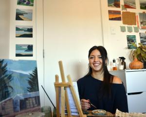 University of Otago student Emma Milburn is painting 100 paintings of places in Dunedin. Photo:...