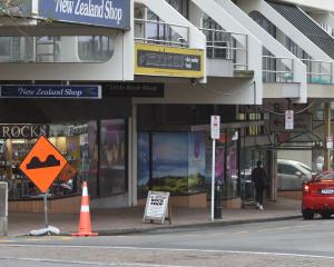 A tour bus stop outside iSite in George St. PHOTO: GREGOR RICHARDSON
