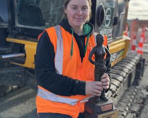 Georgia Campbell with the Women in Contracting award. PHOTO: ANDREW ASHTON
