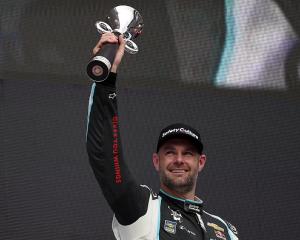 Shane Van Gisbergen celebrates in victory lane after winning the NASCAR Cup Series Viva Mexico...