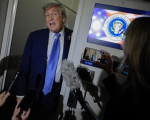 President Trump aboard Air Force One as he returned to Washington from the G7 summit in Banff,...