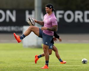 Jonah Lowe warms up at training with the Maori All Blacks in Auckland on Tuesday. Photo: Getty...