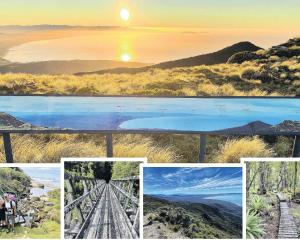 Great Walk . . .The sun sets over the Hump Ridge Track, which weaves through native forest, sub...