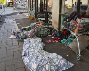 Homeless people sleeping on Hereford St. Photo: Geoff Sloan