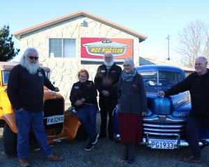 Gearing up for the 50th anniversary of the Whitestone Rodders club are members (from left) Geoff...