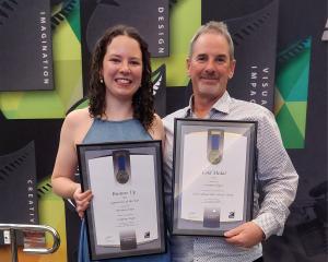 Creation Signs signwriter Brianna Hart and manager Riki Shuttleworth hold their awards at the New...