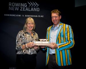 Rowing New Zealand board member Virginia Le Bas presents the award for club of the year to Otago...