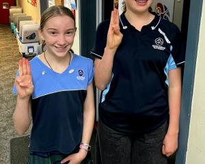 Peak achievers . . .Mosgiel Guides members Amelia Williamson (left) and Amira Johnson, both 12....