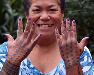 Dunedin-born Samoan Vicky Fitiao proudly shows her Tualima (traditional Samoan hand tattoo), done...